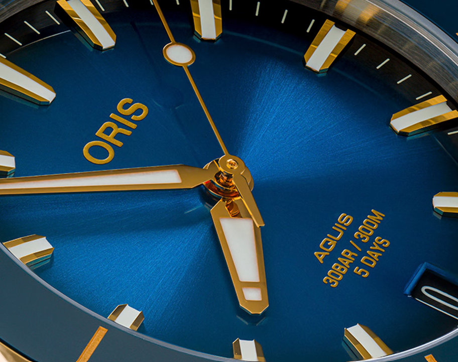 ORIS MOD. AQUIS DATE CALIBRE 400 Blau/Gold